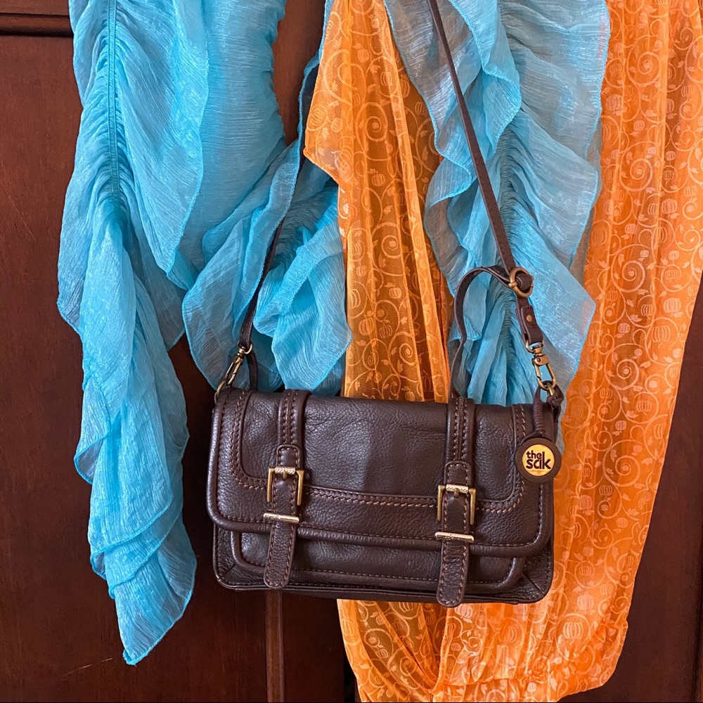 The Sak brown leather double buckle bag